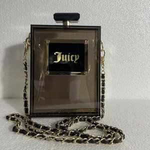 Juicy Couture Crossbody gold accents 5” winds, 6” tall, 2” wide.